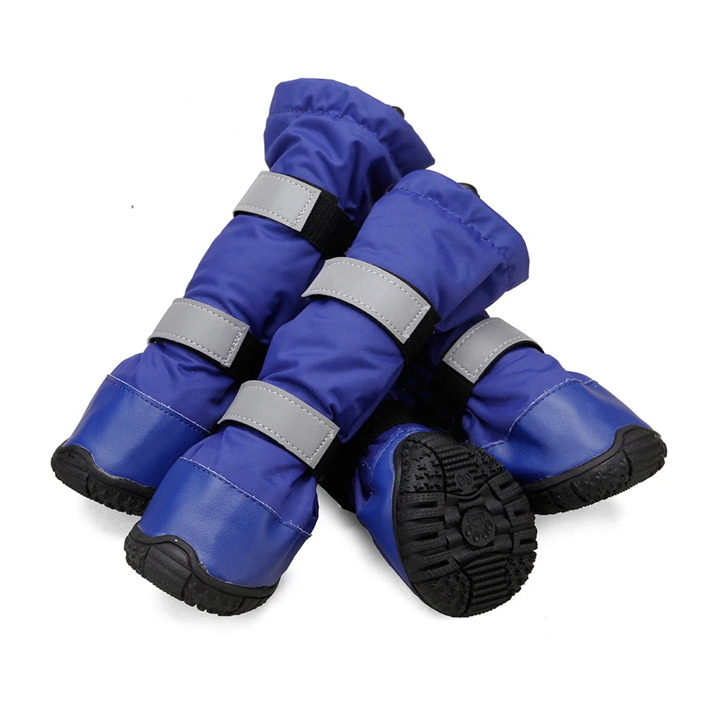 Pair of blue dog boots with reflective straps on a white background