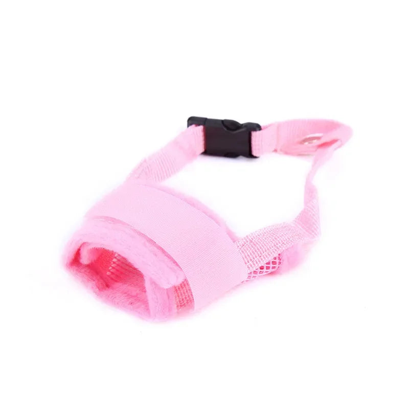 A dog muzzle in pink color, made of nylon,
