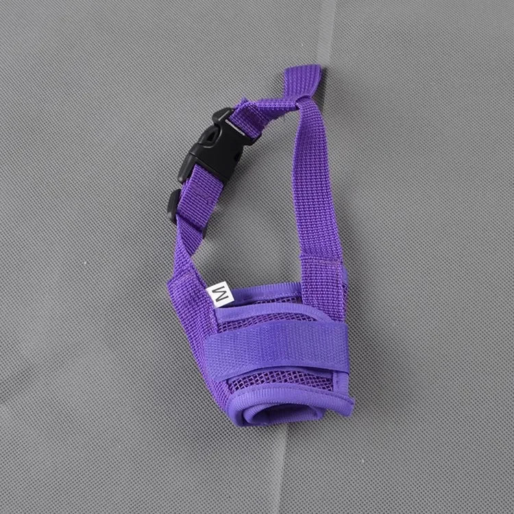 A dog muzzle in purple color, made of nylon, shown both alone