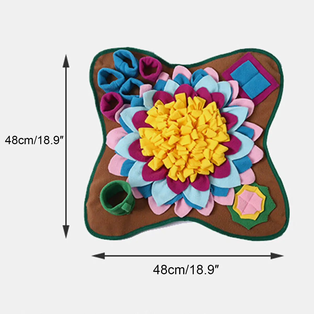 A dog using a colorful snuffle mat with raised petals to find and eat hidden treats, designed for nose work and slow feeding.