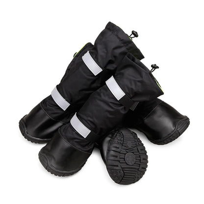 Black boots with reflective stripes on a white background